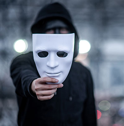Man holding a mask